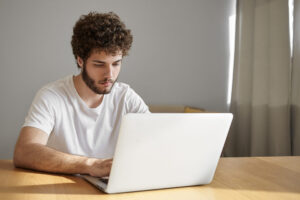 Young man working from home